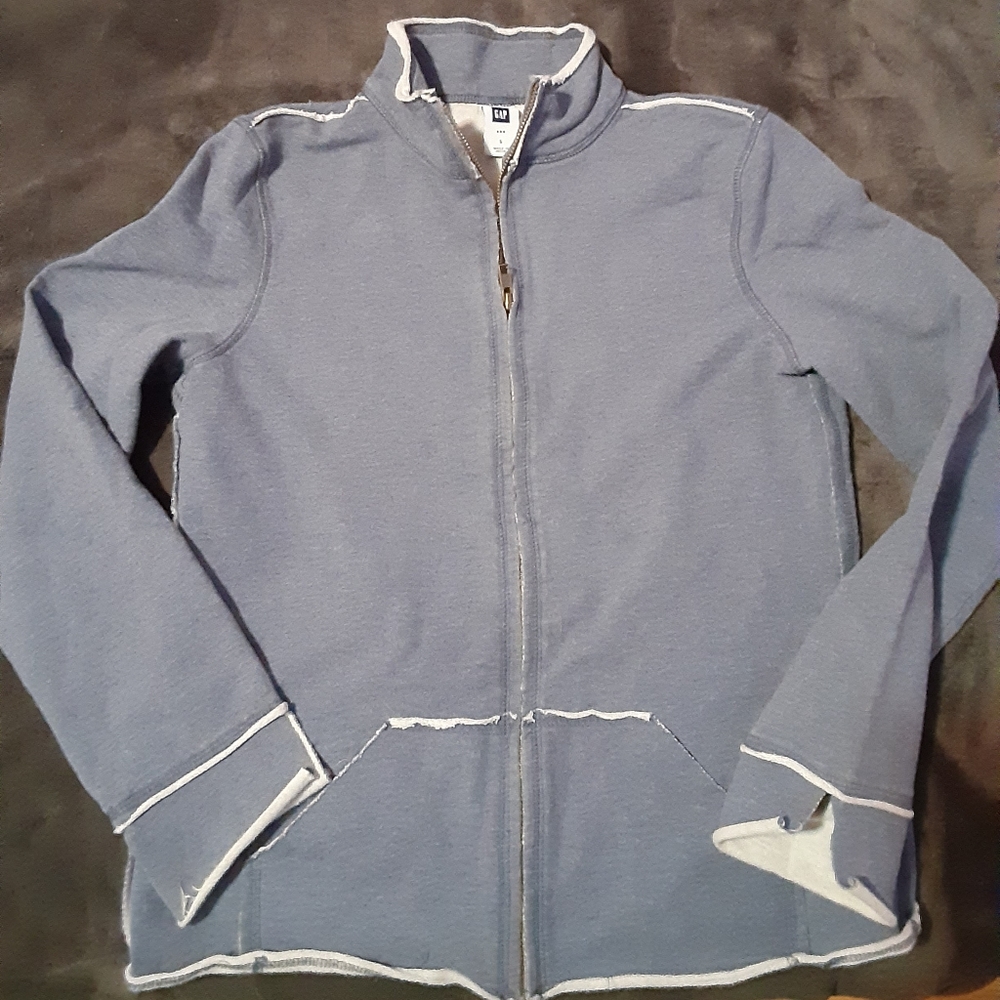 light blue zip up sweatshirt or light sweater coat